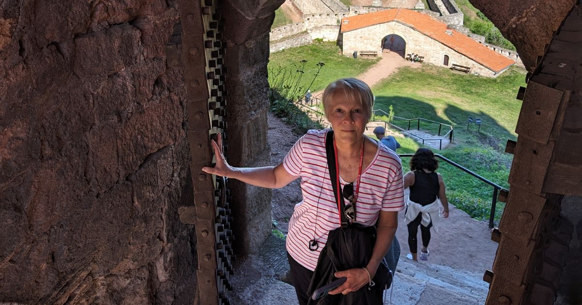 Mary Emmer visiting a mountain fortress in Bulgaria